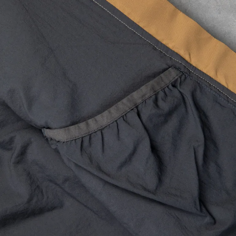 And Wander Alpha Air Jacket Beige