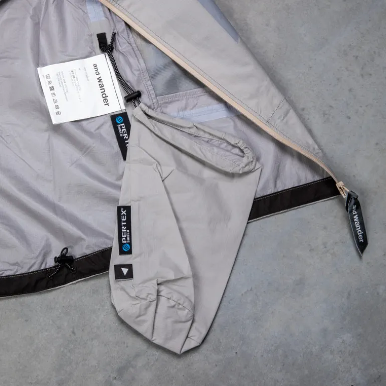 And Wander 3L UL Rain Jacket Light Gray
