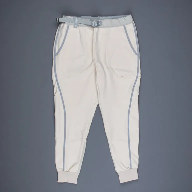 And Wander light fleece pants off white