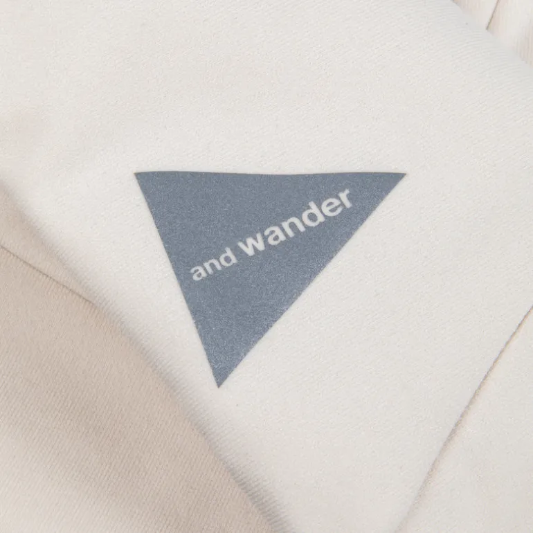 And Wander light fleece pants off white