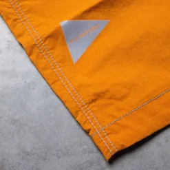 And Wander Light Hike Shorts Orange