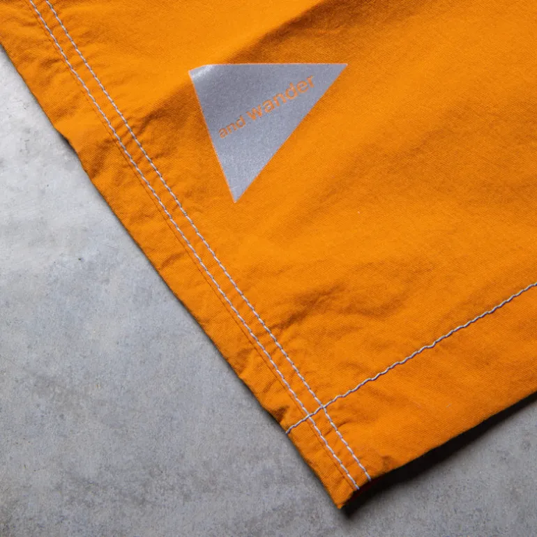 And Wander Light Hike Shorts Orange