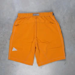 And Wander Light Hike Shorts Orange