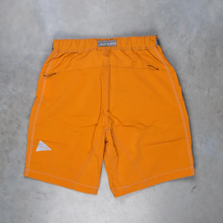 And Wander Light Hike Shorts Orange