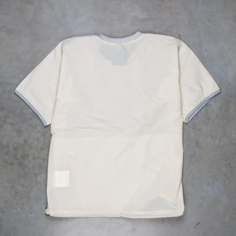 And Wander Pertex Wind T Off-White